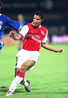 Persie shoots past Zagreb goalkeeper Ivan Turina Persie shoots past Zagreb goalkeeper Ivan Turina