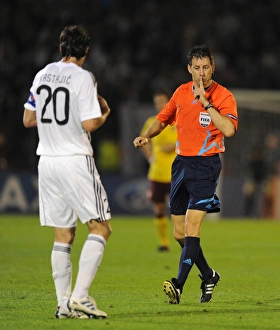Referee Wolfgang Stark with Patrizan defender Mladen Krstajic. Partizan Belgrade 1 Referee Wolfgang Stark with Patrizan defender Mladen Krstajic. Partizan Belgrade 1