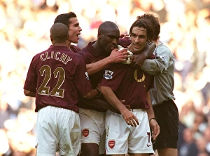 Robert Pires celebrates scoring the Arsenal goal with Sol Campbell, Gael Clichy Robert Pires celebrates scoring the Arsenal goal with Sol Campbell, Gael Clichy