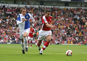 Robin van Persie breaks past Stephen Warnock to score Robin van Persie breaks past Stephen Warnock to score