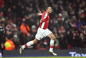 Robin van Persie celebrates the Arsenal goal scored Robin van Persie celebrates the Arsenal goal scored