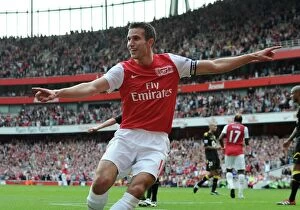 Images Dated 24th September 2011: Robin van Persie celebrates scoring his and Arsenals 2nd goal, his 100th goal for Arsenal