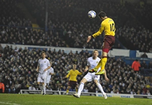Robin van Persie heads past Leeds goalkeeper Kasper Schmeichel to score the 3rd Arsenal Robin van Persie heads past Leeds goalkeeper Kasper Schmeichel to score the 3rd Arsenal
