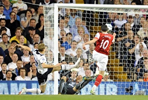 Robin van Persie scores Arsenal's 3rd goal past Heurelho Gomes and Michael Dawson Robin van Persie scores Arsenal's 3rd goal past Heurelho Gomes and Michael Dawson