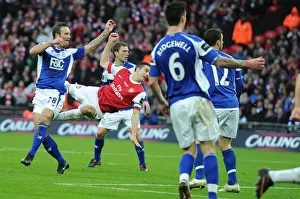 Robin van Persie shoots past Birmingham goalkeeper Ben Foster for the Arsenal goal Robin van Persie shoots past Birmingham goalkeeper Ben Foster for the Arsenal goal