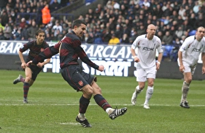 Robin van Persie shoots past Bolton goalkeeper Ali Al Hasbi to score the 2nd Arsenal goal Robin van Persie shoots past Bolton goalkeeper Ali Al Hasbi to score the 2nd Arsenal goal