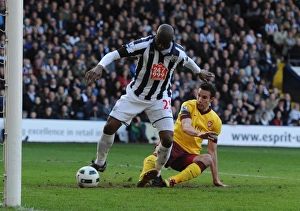 Robin van Persie taps the ball past WBA goalkeeper Scott Carson to score the 2nd Arsenal Robin van Persie taps the ball past WBA goalkeeper Scott Carson to score the 2nd Arsenal