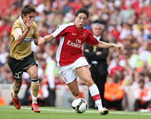Samir Nasri (Arsenal) Fausto Rossi (Juventus) Samir Nasri (Arsenal) Fausto Rossi (Juventus)