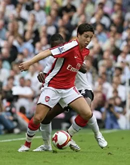 Images Dated 23rd August 2008: Samir nasri (Arsenal) John Paintsil (Fulham)