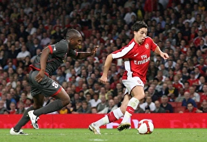 Samir Nasri breaks past Edson Braafheid to score the 1st Arsenal goal Samir Nasri breaks past Edson Braafheid to score the 1st Arsenal goal