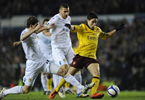 Samir Nasri breaks past Leeds defender Ben Parker to score the 1st Arsenal goal Samir Nasri breaks past Leeds defender Ben Parker to score the 1st Arsenal goal