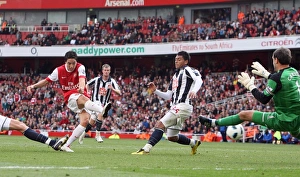 Samir Nasri scores his and Arsenal's 2nd goal past Scott carsona and Gonzalo Jara Samir Nasri scores his and Arsenal's 2nd goal past Scott carsona and Gonzalo Jara