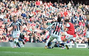 Samir Nasri shoots past WBA goalkeeper Scott Carson to score the 2nd Arsenal goal Samir Nasri shoots past WBA goalkeeper Scott Carson to score the 2nd Arsenal goal