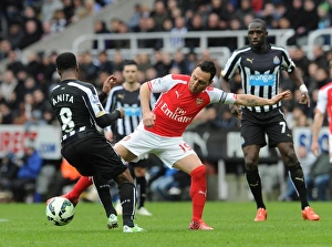 Santi Cazorla (Arsenal) Vernon Anita (Newcastle). Newcastle United 1:2 Arsenal. Barclays Santi Cazorla (Arsenal) Vernon Anita (Newcastle). Newcastle United 1:2 Arsenal. Barclays