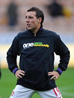 Santi Cazorla (Arsenal) warms up in his Kick it Out T Shirt. Norwich City 1:0 Arsenal Santi Cazorla (Arsenal) warms up in his Kick it Out T Shirt. Norwich City 1:0 Arsenal