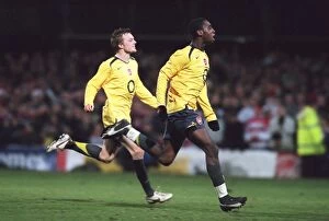 Images Dated 22nd December 2005: Sebastian Larsson and Johan Djourou (Arsenal) celebrate winning the penalty shoot out