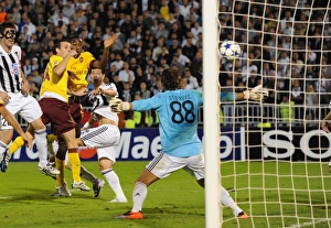 Sebastien Squillaci heads past Partizan goalkeeper Vladimir Stojkovic to score the 3rd Sebastien Squillaci heads past Partizan goalkeeper Vladimir Stojkovic to score the 3rd
