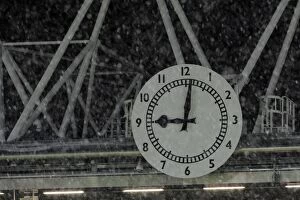 Images Dated 30th November 2010: Snow falls across the Clock. Arsenal 2: 0 Wigan Athletic. Carling Cup, Quarter Final