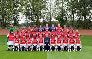 ST ALBANS, ENGLAND - SEPTEMBER 20: Arsenal Squad 2013/14 with Gunnersaurus at London ST ALBANS, ENGLAND - SEPTEMBER 20: Arsenal Squad 2013/14 with Gunnersaurus at London