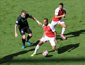 Theo Walcott and Alexis Sanchez (Arsenal) Glen Whelan (Stoke). Arsenal 2:0 Stoke City Theo Walcott and Alexis Sanchez (Arsenal) Glen Whelan (Stoke). Arsenal 2:0 Stoke City