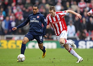 Theo Walcott (Arsenal) Danny Collins (Stoke). Stoke City 3:1 Arsenal. FA Cup 4th Round Theo Walcott (Arsenal) Danny Collins (Stoke). Stoke City 3:1 Arsenal. FA Cup 4th Round