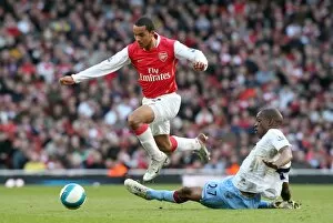 Images Dated 1st March 2008: Theo Walcott (arsenal) Isaiah Osbourne (Villa)