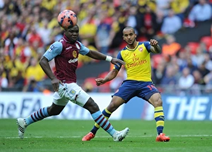 Theo Walcott (Arsenal). Jores Okore (Villa). Arsenal 4:0 Aston Villa. FA Cup Final Theo Walcott (Arsenal). Jores Okore (Villa). Arsenal 4:0 Aston Villa. FA Cup Final