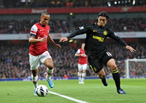 Theo Walcott (Arsenal) Roger Espinoza (Newcastle). Arsenal 4:1 Wigan Athletic. Barclays Theo Walcott (Arsenal) Roger Espinoza (Newcastle). Arsenal 4:1 Wigan Athletic. Barclays