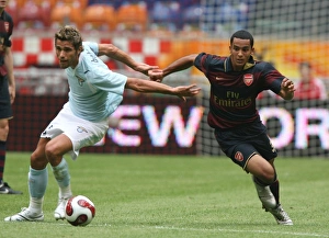 Theo Walcott (Arsenal) Valon Behrami (Lazio) Theo Walcott (Arsenal) Valon Behrami (Lazio)