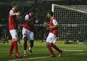 Theo Walcott celebrates scoring the 4th Arsenal goal with Emmanuel Adebayor Theo Walcott celebrates scoring the 4th Arsenal goal with Emmanuel Adebayor
