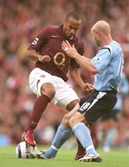 Images Dated 25th October 2005: Thierry Henry (Arsenal) Danny Mills (Man City). Arsenal 1: 0 Manchester City