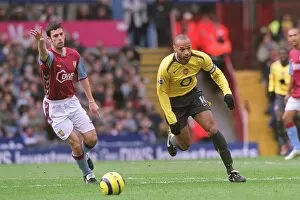 Images Dated 5th January 2006: Thierry Henry (Arsenal) Mark Delaney (Aston Villa). Aston Villa 0: 0 Arsenal