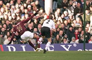 Thierry Henry scores Arsenals 1st goal under pressure from Moritz Volz (Fulham) Thierry Henry scores Arsenals 1st goal under pressure from Moritz Volz (Fulham)