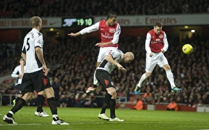 Thomas Vermaelen heads past ther Fulham defence to score the Arsenal goal during the Thomas Vermaelen heads past ther Fulham defence to score the Arsenal goal during the
