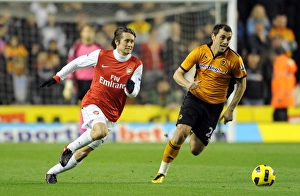 Tomas Rosicky (Arsenal) Nenad Milijas (Wolves). Wolverhampton Wanderers 0:2 Arsenal Tomas Rosicky (Arsenal) Nenad Milijas (Wolves). Wolverhampton Wanderers 0:2 Arsenal