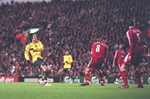 Tomas Rosicky shoots past Liverpool captain Steven Gerrard to score the 1st Arsenal goal Tomas Rosicky shoots past Liverpool captain Steven Gerrard to score the 1st Arsenal goal