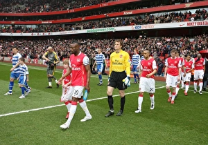 William Gallas (Arsenal) and Graeme Murty (Reading) lead out the teams before the match William Gallas (Arsenal) and Graeme Murty (Reading) lead out the teams before the match