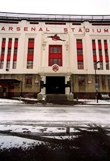 Highbury Stadium Collection: Winter's Embrace: Arsenal Stadium in Snowy Highbury, London