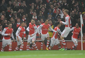Yaya Sanogo celebrates scoring Arsenals 1st goal with his team mates. Arsenal 2 Yaya Sanogo celebrates scoring Arsenals 1st goal with his team mates. Arsenal 2