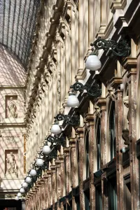 Lamps and columns of the Galerie de la Reine shopping gallery, Brussels, Belgium Lamps and columns of the Galerie de la Reine shopping gallery, Brussels, Belgium