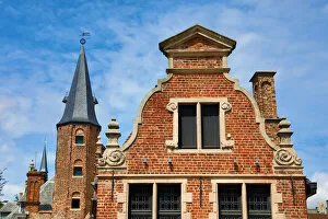 Medievel tower and roof decorations on the Huidevettershuis, Bruges, Belgium