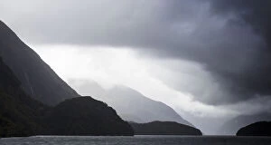 Dark clouds and misty weather in Doubtful Sound, Southland in New Zealand