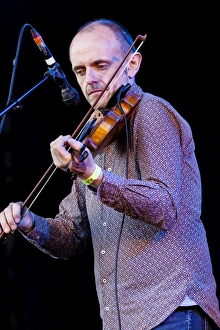 Duncan Chisholm of the Julie Fowlis Band playing at Oban Live in Scotland Duncan Chisholm of the Julie Fowlis Band playing at Oban Live in Scotland