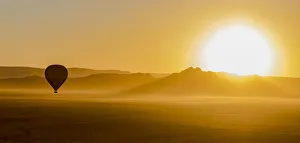 A hot air balloon at Namib-Naukluft National Park, Namibia A hot air balloon at Namib-Naukluft National Park, Namibia