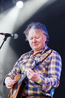 Manus Lunny of Capercaillie playing at Oban Live in Scotland Manus Lunny of Capercaillie playing at Oban Live in Scotland