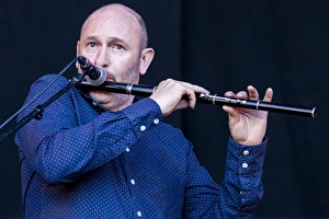 Michael McGoldrick of Capercaillie playing at Oban Live in Scotland Michael McGoldrick of Capercaillie playing at Oban Live in Scotland