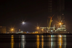 A night-time view of the fabrication yard at Nigg Point in Scotland A night-time view of the fabrication yard at Nigg Point in Scotland