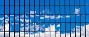 The sky reflected in a glass-fronted building in Wellington, New Zealand The sky reflected in a glass-fronted building in Wellington, New Zealand
