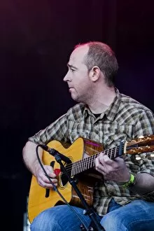 Tony Byrne of the Julie Fowlis Band playing at Oban Live in Scotland