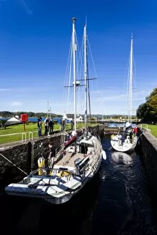 Two yachts in the Crinan Canal, Scotland